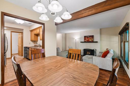 10x8 Main Floor Dining room with North East facing windows leading out to the wooded patio.
