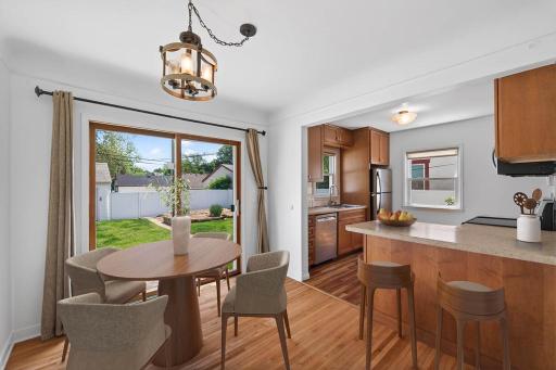 Nice informal dining area and kitchen breakfast bar.