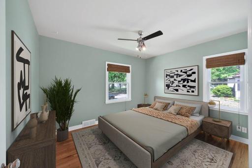 Both main floor bedrooms feature ceiling fans.