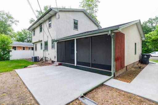 Enjoy the summer nights on the patio or move into the screened in porch.jpg