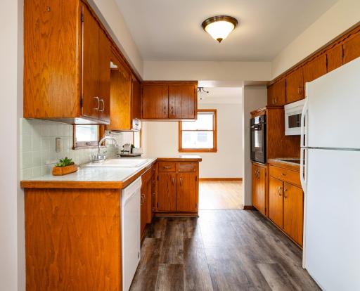 View from informal dining room through kitchen.jpg