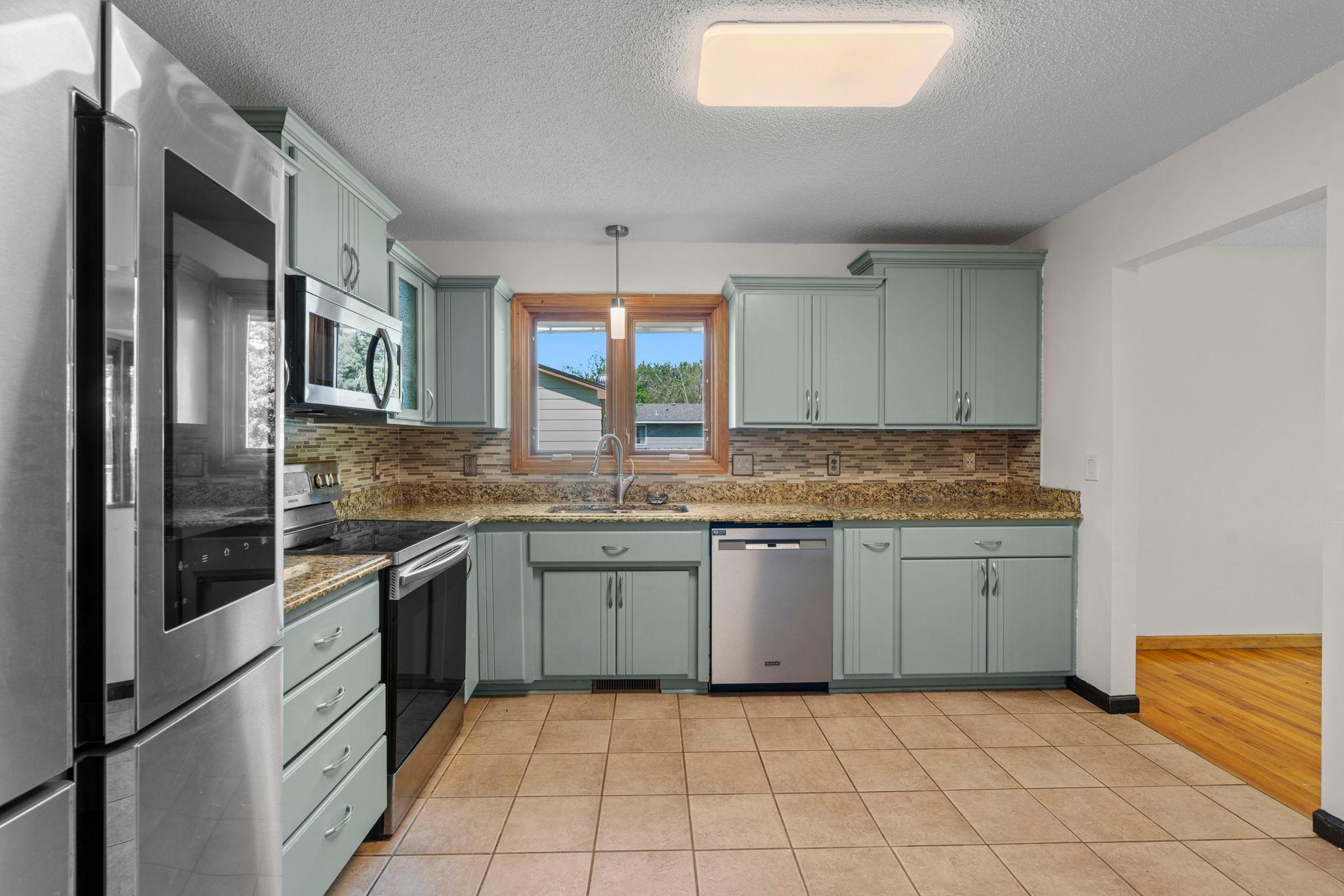 Kitchen w/ Stainless Steel Appliances