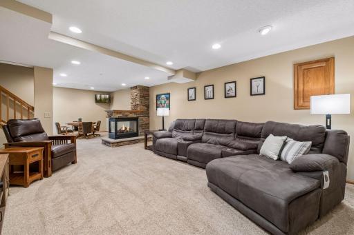 Gas burning fireplace in the lower level living room