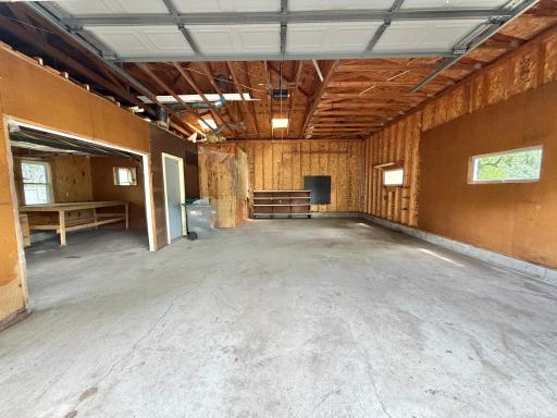 Generous oversized Garage with space for vehicles and more!