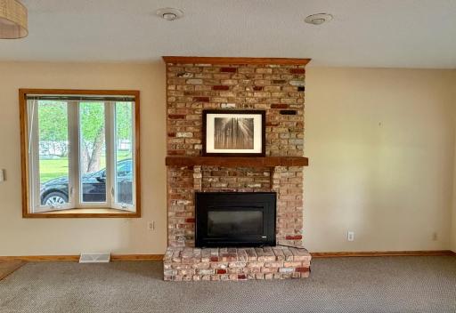 Cozy Brick gas fireplace adds charm and comfort