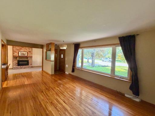 Enjoy abundant natural light through the living room's large picture window.