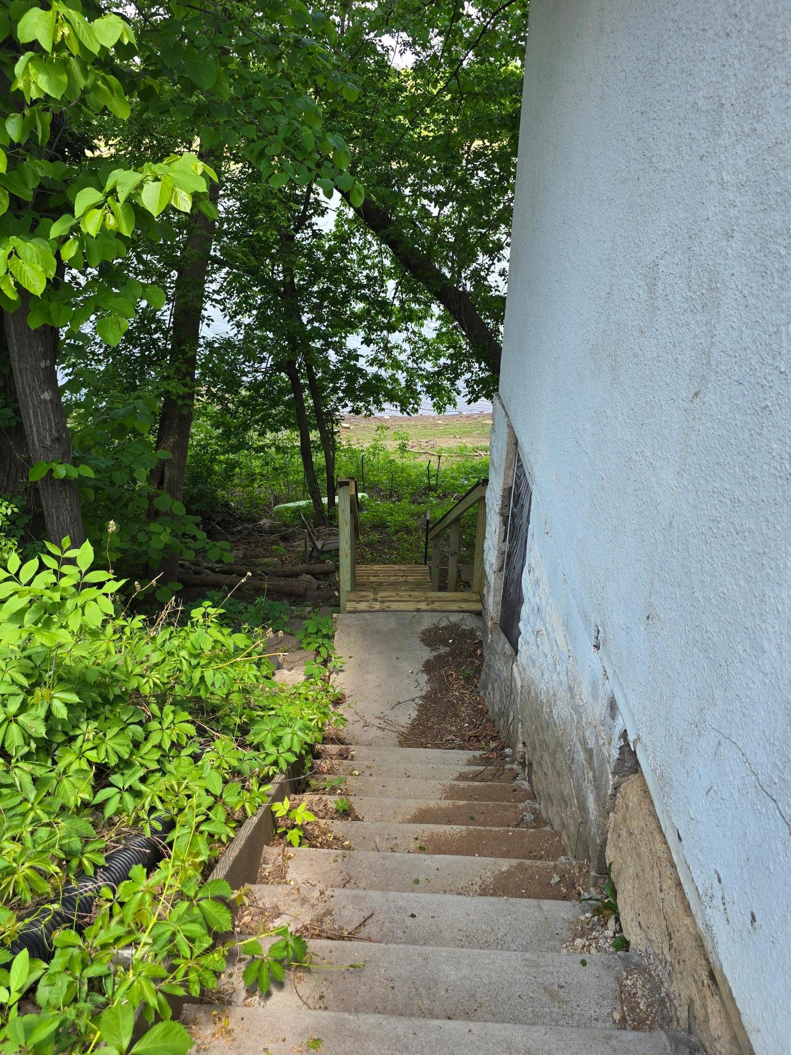 Concrete and wood steps leading to the lake