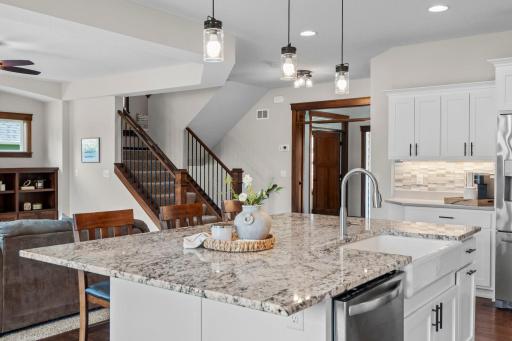 This custom built home has high quality touches everywhere. Transom windows over doorways, solid wood 3-panel doors, solid wood trim, and solid wood floors.