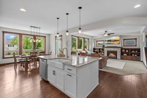 The open-concept main level features a spacious kitchen, dining and great room.