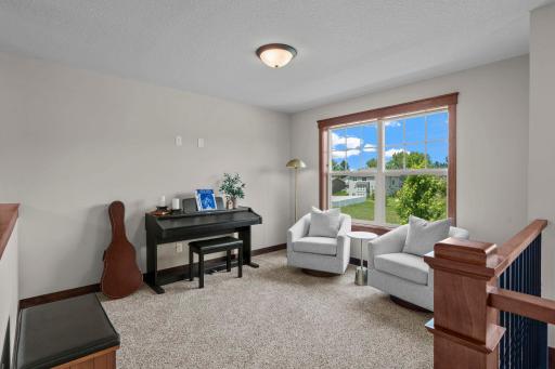 The upper level loft space can flex as a music room, second home office, lounge space, exercise room, reading room or whatever best fits your lifestyle.