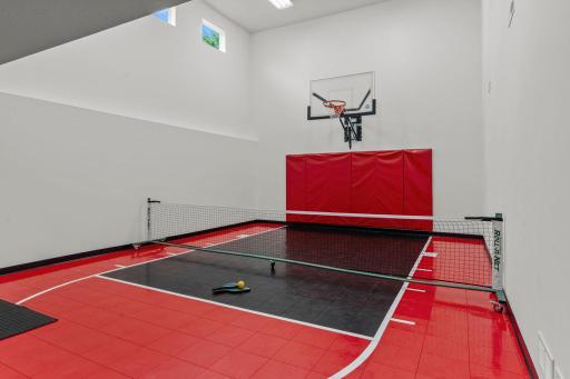The indoor sport court takes this home to another level. Imagine playing pickleball, basketball or any sport year round in this space.
