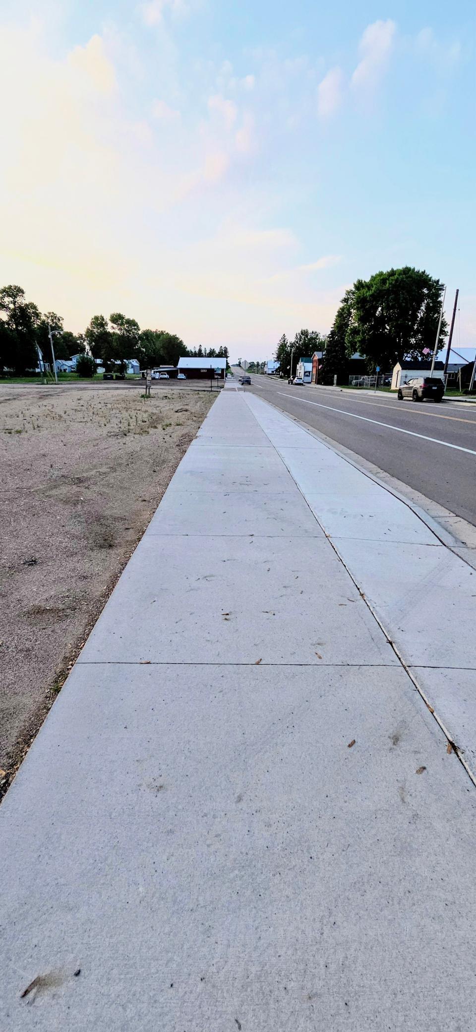 New Sidewalks & Paved Street Facing North