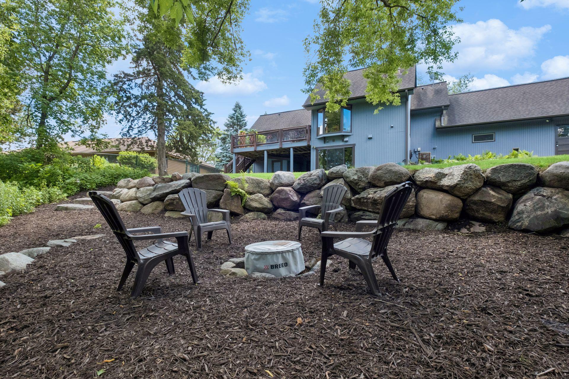 Welcome to lakeside living, in desirable Timber Lakes enclave near the heart of Eden Prairie. Privacy, peace, and luxurious lifestyle with your own dock and 89 ft of shoreline to enjoy watching the seasons change on the lake.