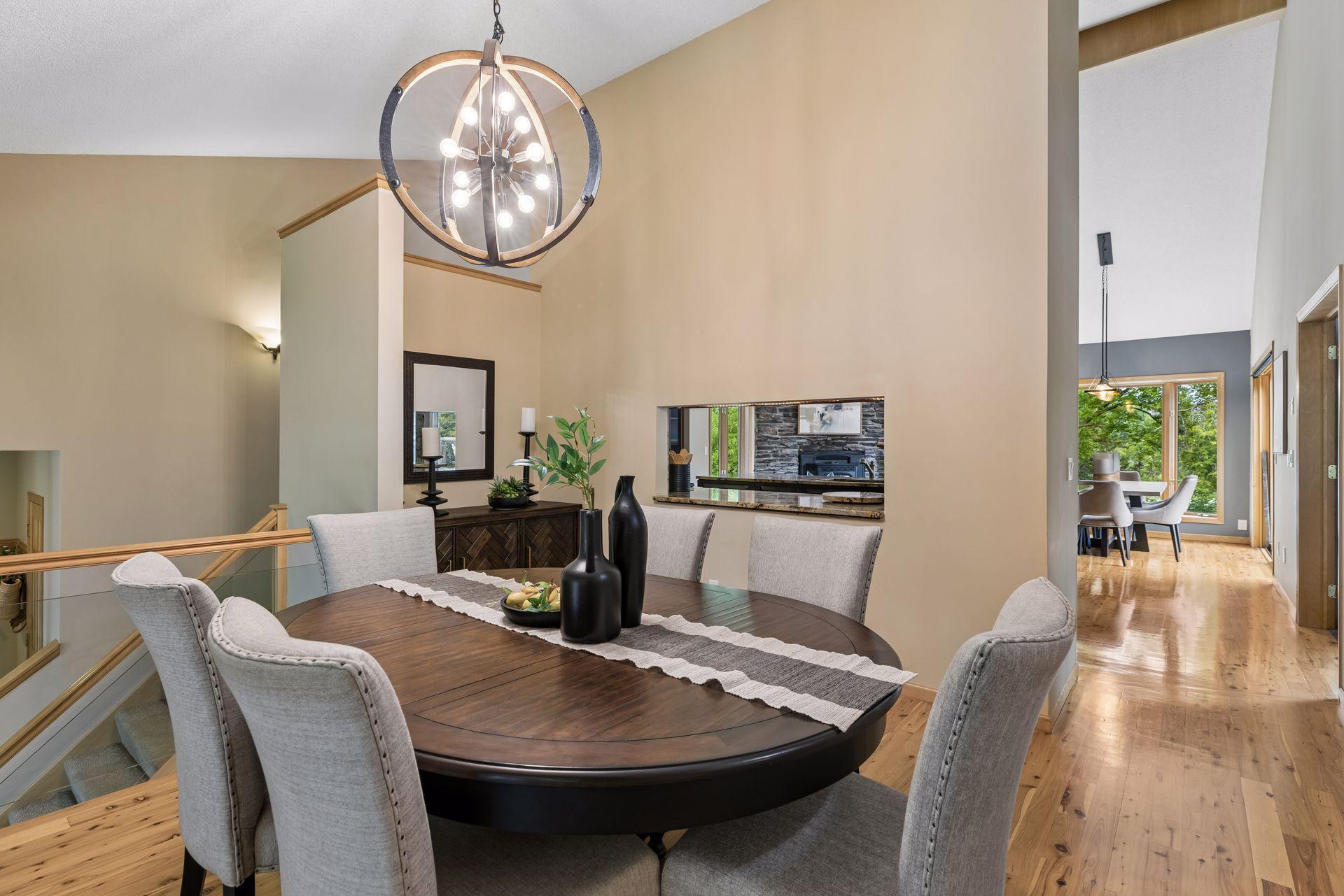 Dining room features pass-through wall to kitchen countertops.