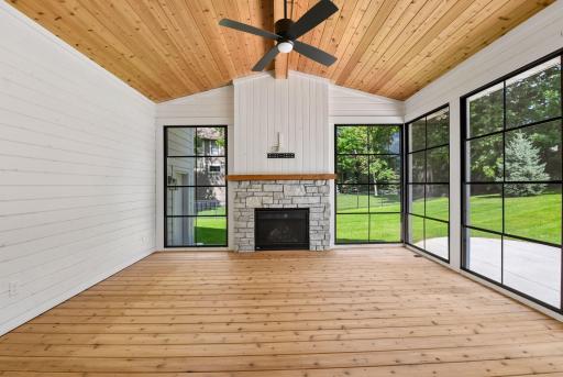 Enjoy three seasons with gas fireplace and EZ screens