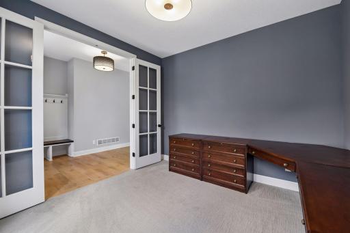 Large main floor office w/ Double door entry off Foyer