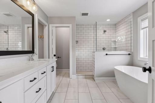 Beautiful Primary bath overlooks private backyard