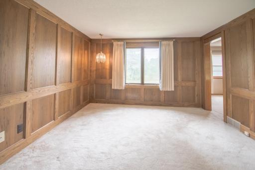 Main floor den or family room looking toward the backyard