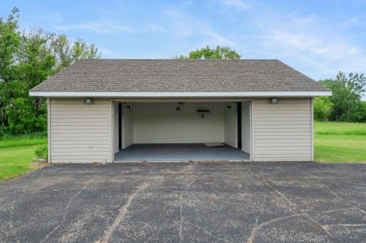 For even more space, the property includes a second two stall detached garageâfully finished, insulated, and heatedâwith two spacious storage rooms, ideal for tools, hobbies, or seasonal items.