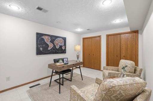Also on the lower level is a well-appointed office complete with dual closets, located just steps from a Â¾ bathroom.