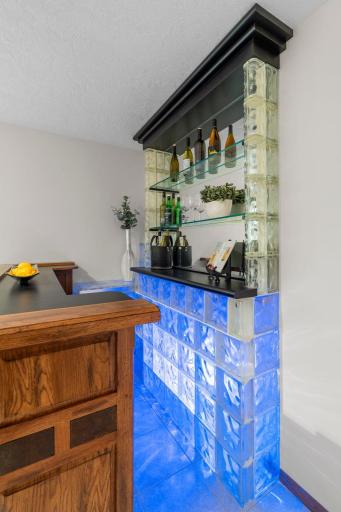 Another perspective showcasing the distinctive illuminated glass block backdrop.