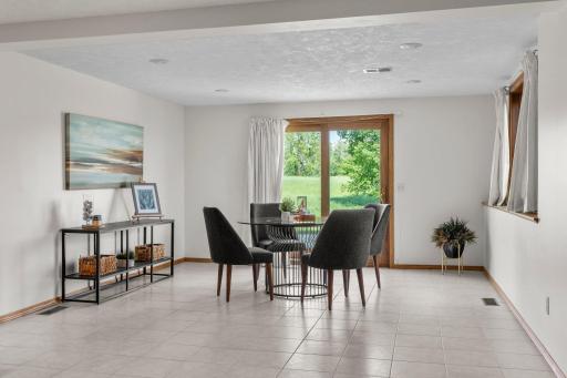 The lower level is finished with premium Italian tile flooring throughout and offers walkout access from the recreation area to a spacious concrete patioâperfect for seamless indoor-outdoor entertaining.