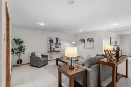An additional perspective of the lower-level family room.