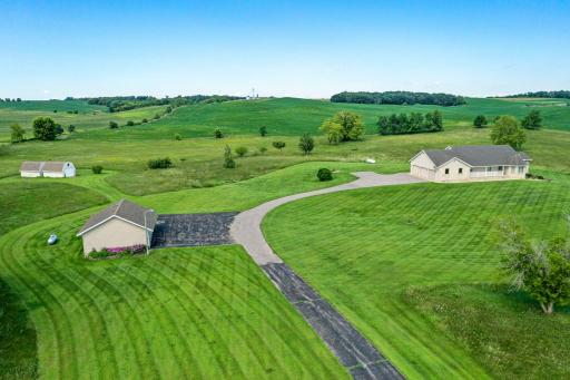 Situated on over 34 acres of rolling hills, woodlands, and open meadows, it serves as a peaceful sanctuary immersed in nature.