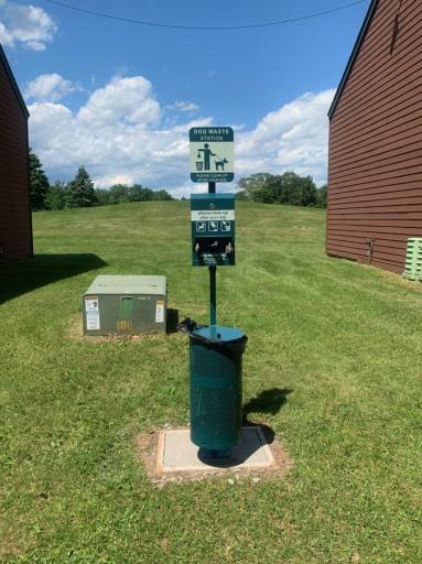 Doggie waste station. Option to allow a dog on the main level if the owner has agreed to pets being in their units. If you buy this unit you can bring your pet and designate your property as dog friendly and increase your rental income a bit.