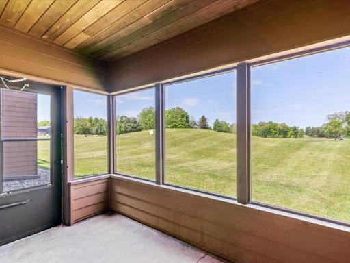 Lovely screened in porch for your enjoyment looking out unto Alex 9 golf course. Walk to the course and enjoy a game of golf.