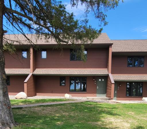 Attractive duplex type design (main and upper level units) with 1090 square feet total which can be used separately. Brand new Andersen maintenance free low-E glass windows across the front of the unit.