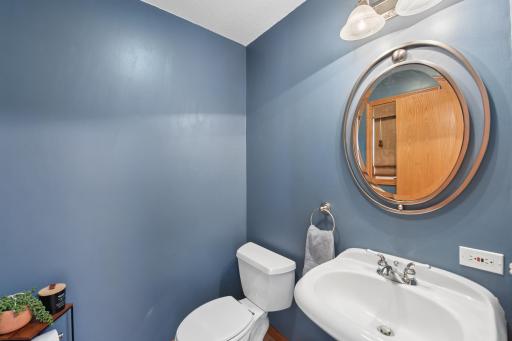 Half bath off of the hallway main floor.
