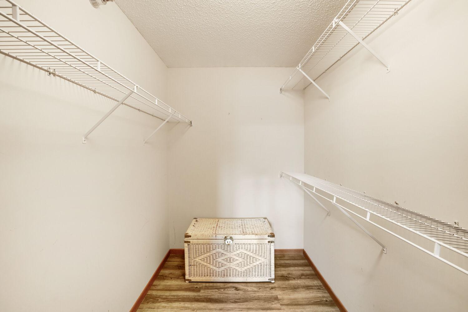 One of two walk in closets in primary bedroom!