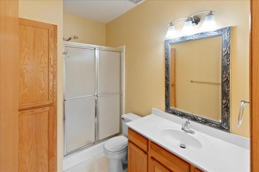 Main floor primary bedroom has a private bathroom