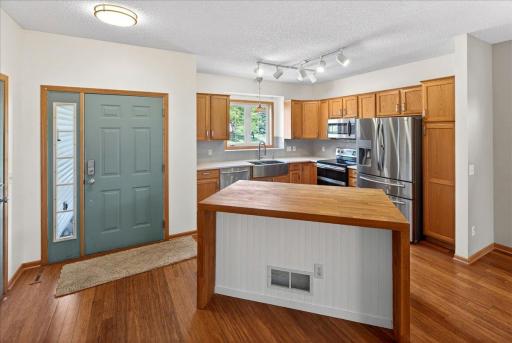 Kitchen is located at the front of the home