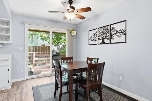 Enjoy seamless indoor-outdoor living with a spacious dining area that opens directly to the backyard deck. The open layout creates an inviting setting for family dinners and summer gatherings.