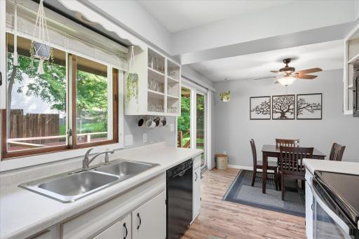 The kitchen opens seamlessly to the dining area, providing excellent functionality for entertaining and everyday living. Easy access to the deck makes outdoor dining a breeze.