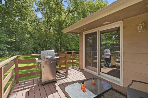 Conveniently located just off the dining area, the freshly stained deck creates a seamless extension of the living space. Large patio doors allow natural light to flood the interior while providing easy outdoor access.