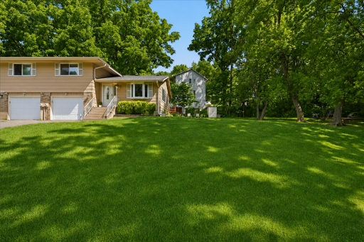 Enjoy an oversized, park-like front yard surrounded by mature trees, offering exceptional outdoor space, privacy, and a beautiful natural setting. The generous lot provides plenty of room for recreation, gardening, or relaxing outdoors.