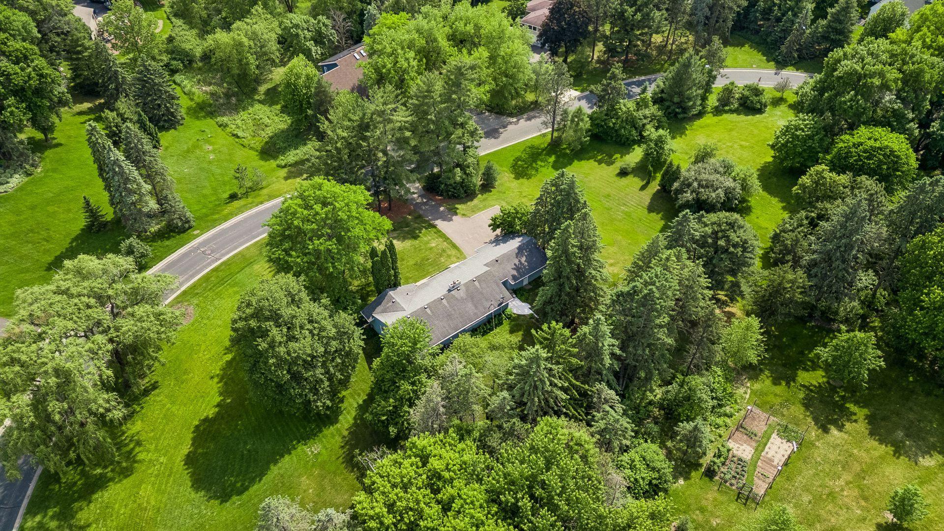 Private, peaceful neighborhood with an acreage feel