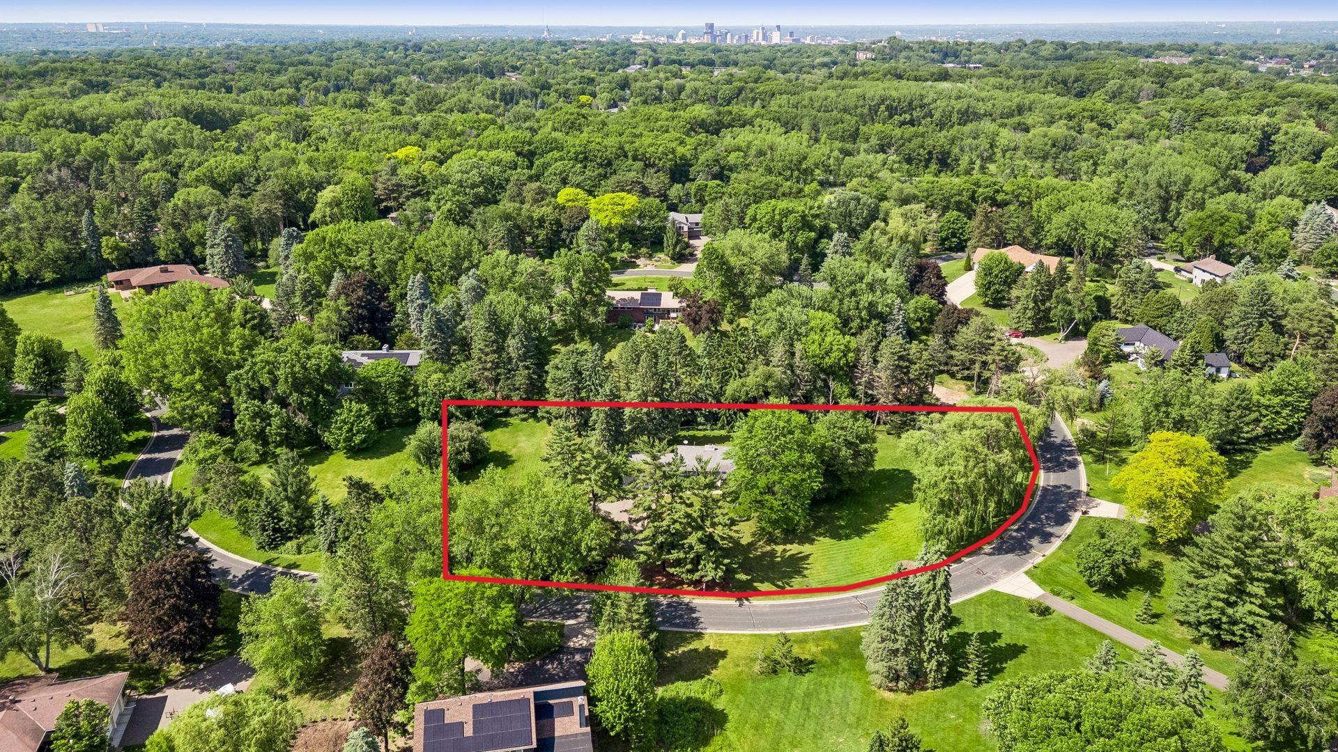 1.29 acres amid natural surroundings, offering a peaceful and private setting to call home. (Lot lines depicted are approximate and for illustrative purposes only).