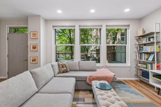 Living room overlooks patio and is set back for privacy