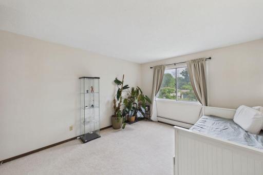 This second bedroom makes a great guest room, office, den, or whatever you need the space for.