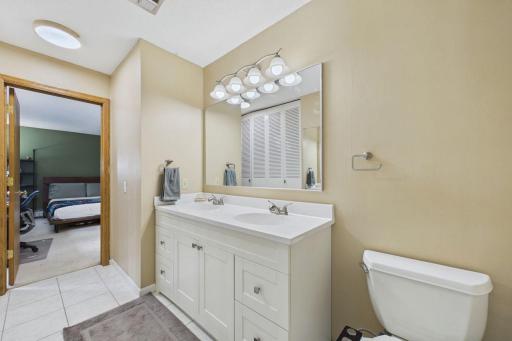 Primary 1/2 bath with updated double sink vanity.