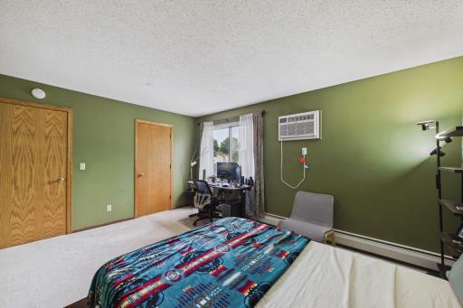 Door on the right leads to primary ensuite bathroom and closet.