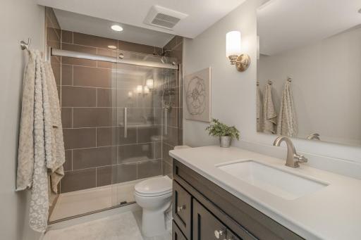 Lower level bath has designer touches that you'll love.