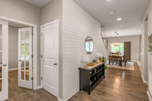 Inviting foyer provides a gorgeous first impression. French doors lead to main level office.