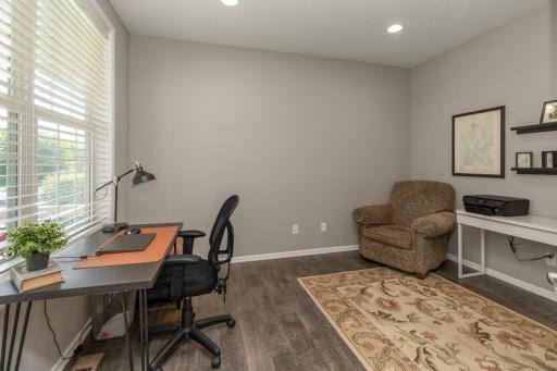 Through the french doors, this front-facing office offers a quiet retreat.