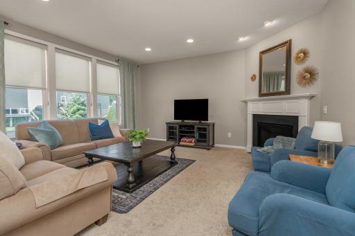You'll love the gas fireplace and designer window treatments.