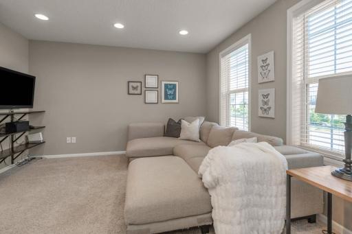 Upstairs, the loft is versatile and spacious!